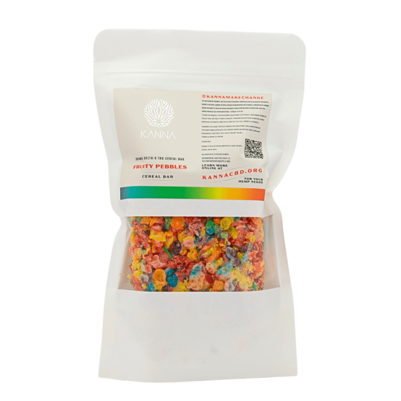 A sealed white pouch with a clear window displaying a colorful Fruity Pebbles cereal bar and a label reading "KANNA Cereal Bar" with branding and product information.