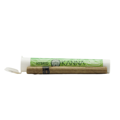 A rolled hemp flower blunt labeled "Hybrid" lies in front of a green and white plastic tube labeled "KANNA Top Shelf Hemp Flower.